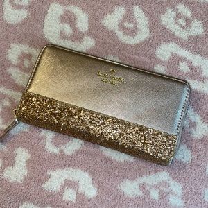 Kate spade wallet champagne and rose gold color